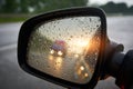 Truck in a rear view mirror at sunset Royalty Free Stock Photo