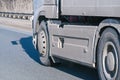 Truck wheels on road in motion Royalty Free Stock Photo