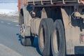 Truck wheels on road in motion Royalty Free Stock Photo