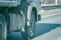 Truck wheels on road in motion Royalty Free Stock Photo