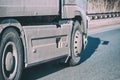 Truck wheels on road in motion Royalty Free Stock Photo