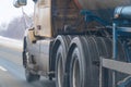 Truck wheels on road in motion Royalty Free Stock Photo