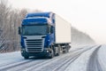 Truck on a winter road Royalty Free Stock Photo