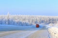 Truck on a winter road in the snow-covered taiga of Siberia