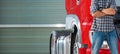 Trucker in front of his brand new red semi truck Royalty Free Stock Photo