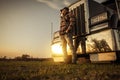 Trucker in Front of His Semi Truck During Sunset Royalty Free Stock Photo