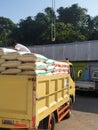 a truckload of rice is parked at a traditional Indonesian market. 5 july 2021