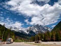 Trucks ascend Rogers Pass in British Columbia mountains Royalty Free Stock Photo