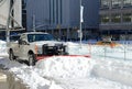 Trucks cleaning snow from streets after blizzard