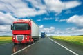 Trucks at country road at sunny day