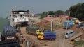 Trucks disembark from the Daulatdia ferry boat at the Padma river bank at Chhota Dhulandi, Bangladesh.