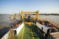 Trucks enter the ferry at Penajam Paser Utara Harbor, one of the main transportation hubs in PPU, East Kalimantan, Indonesia.