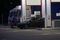 Trucks at a gas station at night Royalty Free Stock Photo