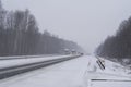 Trucks on the highway in a blizzard Royalty Free Stock Photo