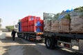 Trucks loaded with goods enter the Gaza Strip from Kerem Shalom crossing, between the Gaza Strip and Israel