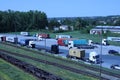 Trucks loading containers in the river port in Melnik, Czech Republic