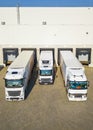 Trucks loading goods in the warehouse