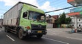 trucks making local commercial delivery at urban city and on the city streets in asia logistical transport system