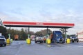 Trucks and man pumping diesel fuel at the AM PM gas station Royalty Free Stock Photo