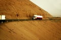 Trucks on mountainside road Royalty Free Stock Photo