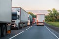 Trucks move in opposite directions on highway