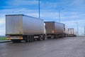 Trucks move in a row on the highway