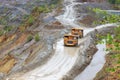 Trucks in open pit Royalty Free Stock Photo