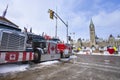 Trucks parked outside Parliament Hill in the early days of the Freedom Convoy protest in Ottawa Royalty Free Stock Photo