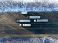 Trucks are parked on the side of the road. Top view of transport trucks Royalty Free Stock Photo