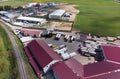 Trucks are in the parking lot of a trucking company. View from above