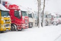 Trucks parking in severe winter storm. Prohibition of traffic in heavy snow