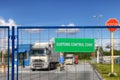 Lorries pass through checkpoint of logistics complex with custom