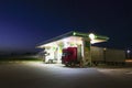 Trucks refuel at the gas station at night Royalty Free Stock Photo