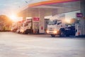 Trucks refueling in petrol station, Transportation vehicle, Business logistics, delivery transport, cargo logistic concept.