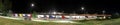 Trucks in rest area at night wide panorama Royalty Free Stock Photo