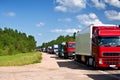 Trucks in a row. Highway Traffic Jam. Royalty Free Stock Photo