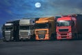 Trucks and semi-trailers in the night Parking lot Royalty Free Stock Photo