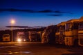 Trucks and semi-trailers in the night Parking lot Royalty Free Stock Photo