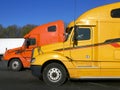 Trucks: side view of two Royalty Free Stock Photo