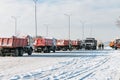 Trucks take out the snow after a blizzard. Cleaning the city from the consequences of a snow storm