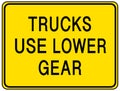 Trucks use lower gear warning sign isolated on white background Royalty Free Stock Photo