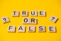 True or false words on a yellow background with a question mark. Choice concept Royalty Free Stock Photo
