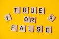 True or false words on a yellow background with a question mark. Choice concept Royalty Free Stock Photo