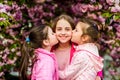 True friendship. Pink our favorite. Children spring garden. Sakura garden. Sisters friends sakura trees background. Kids