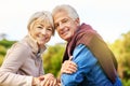 True love is infinite. Portrait of a happy senior couple sitting on a park bench. Royalty Free Stock Photo