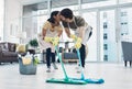 True love means sharing the load. an affectionate young couple mopping the floor together at home. Royalty Free Stock Photo