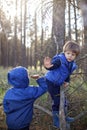 True men friendship, outing of crowed places. Two kids giving high five each other for support Royalty Free Stock Photo