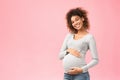 True mother love. African-american pregnant hugging her belly Royalty Free Stock Photo