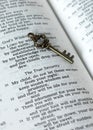 True security verses in open holy bible book and ancient key, closeup Royalty Free Stock Photo