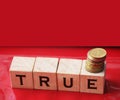 True word on wooden cubes on red. True or false facts, real and fake news concept Royalty Free Stock Photo
